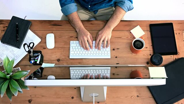 Research, computer and hands of businessman from top view typing for planning, web design and advertising idea. Technology, creative and software with employee and keyboard in digital agency