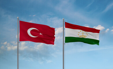 Tajikistan and Turkey flags, country relationship concept