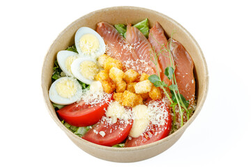 Caesar salad with salmon on a white background for a food delivery site 3
