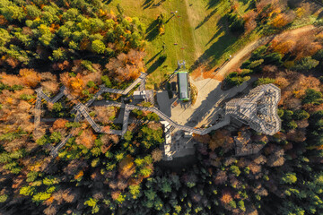 Tree top observation tower in resort town Krynica-Zdroj at sunrise, Poland