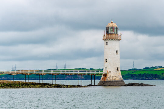 Tarbert Lighthouse on the coast of the sea