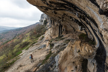 Woman Tourist Discover natural Wonder of Slovenia the Ears of Istra - Geological Karst Formation 