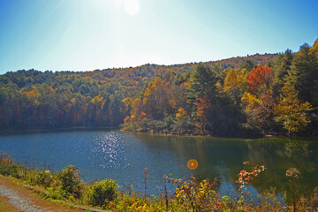 autumn landscape with lake and mountains