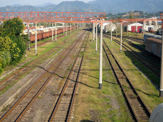 Freight trains. The concept of cargo transportation by rail. Cars for loading.