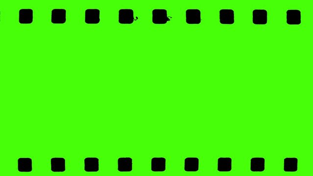 Vintage green screen film strip background with grunge effects. 