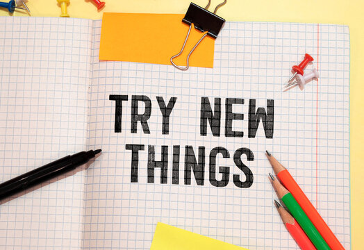 Try new things text on table background.