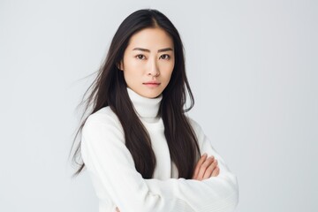 Asian woman serious face portrait white background