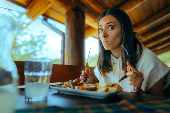 Woman Unhappy With The Meal She Received In A Restaurant. Customer Dissatisfied With The Services Of A Eating House  
