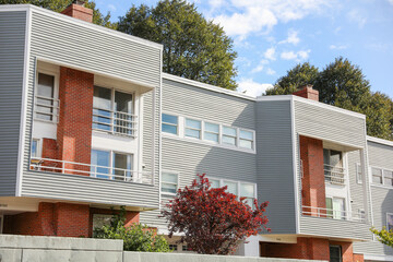 houses symbolize the dream of homeownership amid mortgage concerns, rising interest rates, and soaring property prices, all amidst an era of financial inflation