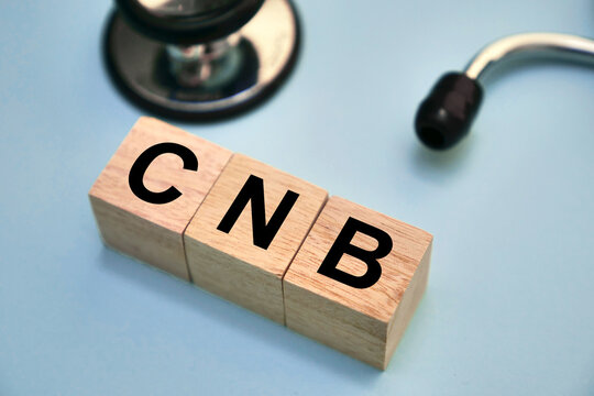 CNB, text words typography written with wooden letter, health and medical