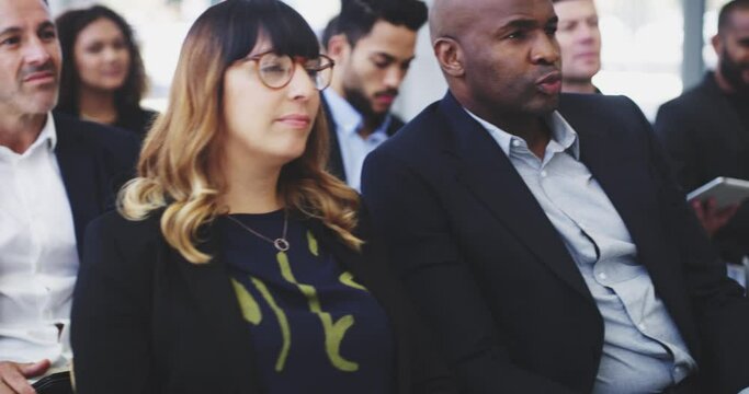 Seminar, business people row or audience listen to project ideas, presentation speech or corporate training. Attention, tradeshow or conference crowd, group or workshop learning at convention meeting