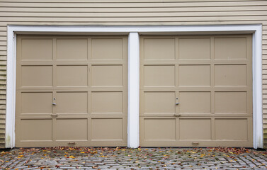 garage door stands tall, symbolizing security and convenience. A gateway to shelter cars and storage, it complements the home's aesthetic while ensuring protection