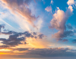 Obraz premium Beautiful panoramic sky with glowing clouds at sunset