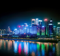 Fototapeta na wymiar Neon night scene of river city in Yuzhong District, Chongqing
