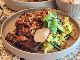 grilled ribs in ceramic plate