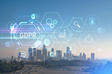 Skyline panorama of Los Angeles downtown at sunset, California, USA. Skyscrapers of LA city. GDPR hologram, concept of data protection regulation and privacy for all individuals in EU Area