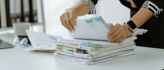 business documents businessman check legal document review Prepare documents or analysis reports,...