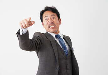 叱る中年のビジネスマン　白背景