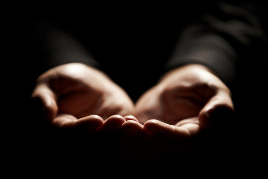Hands, prayer and help from God with charity, closeup and praise with giving, gratitude and respect for religion. Search for guidance, wellness and praying, worship and faith with person and trust