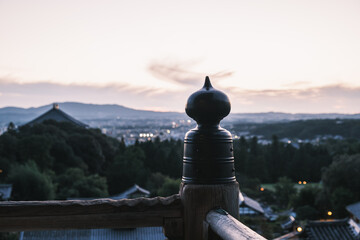 A nostalgic temple illuminated by the beautiful light of dusk【Nigatsu-do】 - obrazy, fototapety, plakaty