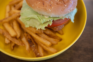 Chicken Sandwich Burger and fries meal ready to eat at work