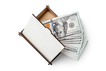 Small wooden gift box with money on a white background. Top view.