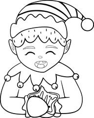 Little elf boy eating star shape cookie