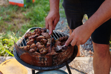 Cooking shashlik on a barbecue.