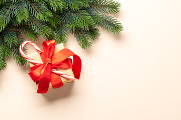 Fototapeta na wymiar Xmas fir tree branch, Christmas gift box and space