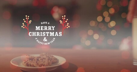 Animation of merry christmas and a happy new year text, cropped hand keeping cookies and milk glass - Powered by Adobe