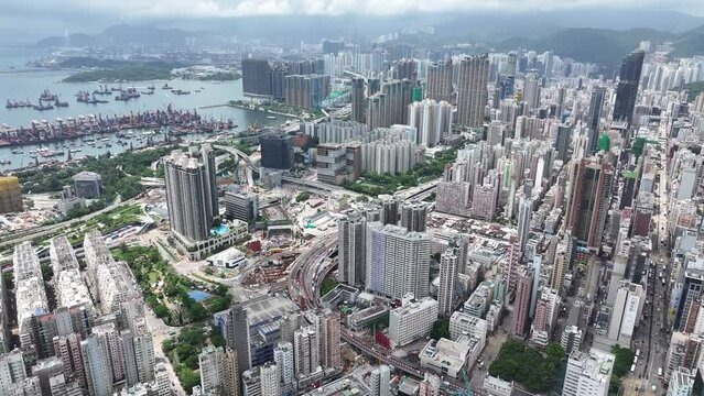 Drone aerial shot city Skyview in Nathan Road Tsim Sha Tsui Mong Kok Jordan Austin Yau Ma Tei Central Hong Kong , a commercial hub with the financial of the Victoria Harbour