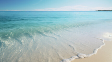 A pristine beach with crystal-clear water lapping against the sand