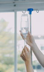 Women Asian doctors hold the patient hand and encourage and provide medical advice While checking...