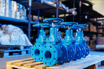 Closeup new blue taps with valve for drinking water pipeline