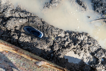 shoe in the mud