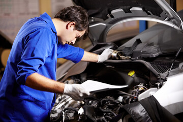 Document, man and technician check engine of car, repair and maintenance. Checklist, mechanic and...