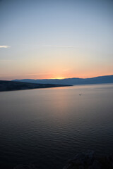 Fototapeta premium sunrise over the sea, clear sky without clouds. golden hour.