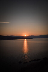 sunrise over the sea, clear sky without clouds. golden hour.