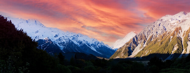 The  sunset view mountain of alpine as snow-capped mount peaks in  Winter mountains