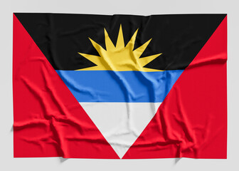 Flag of Antigua and Barbuda. Fabric textured Antigua and Barbuda flag isolated on white background. 3D illustration