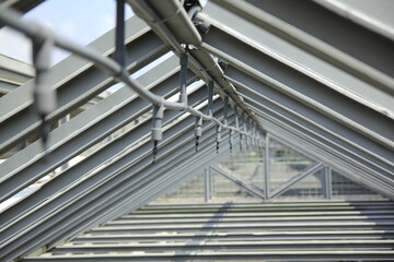 The frame on the building ceiling is equipped with water sprinklers, for green building architectural concept.