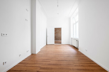 empty apartment room with wooden floor, unfurnished