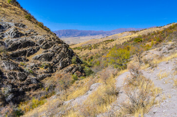 Fototapeta na wymiar scenic view of Karankulsay valley and Korzhantau ridge (Karankul, Tashkent Region, Uzbekistan)