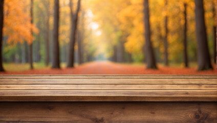 Naklejka na ściany i meble empty wood desk with blurred background of autumn forest