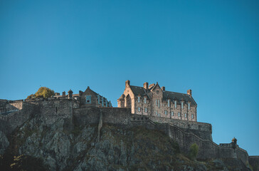 Fototapeta na wymiar Edinburgh, scotland, uk a Majestic Castle on a Hill With a Serene Blue Sky scottish architecture travel