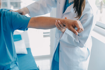 Patient doing some special exercises under supervision in a room.