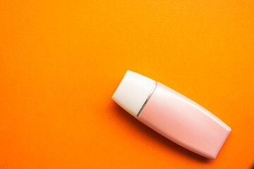 Bottle Cosmetic mockup Package Plastic Product Cream Tube Lotion Container Beauty Summer Sunscreen Blank on Orange Background