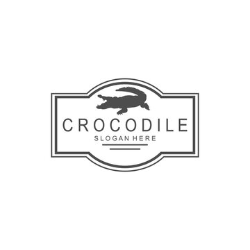 vector image of a black crocodile animal, on a white background.