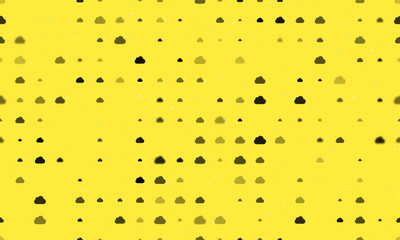 Seamless background pattern of evenly spaced black cloud symbols of different sizes and opacity. Vector illustration on yellow background with stars