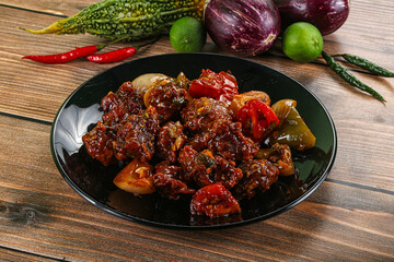 Asian cuisine - pork with chili sauce